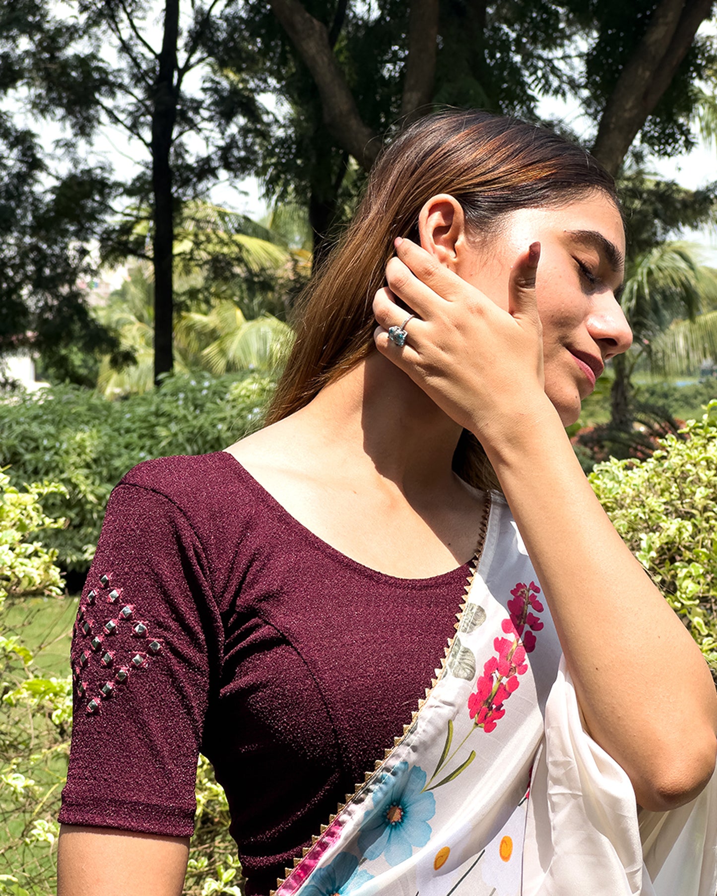 Model wearing the blouse with a saree for a festive ensemble ideal for Navratri.