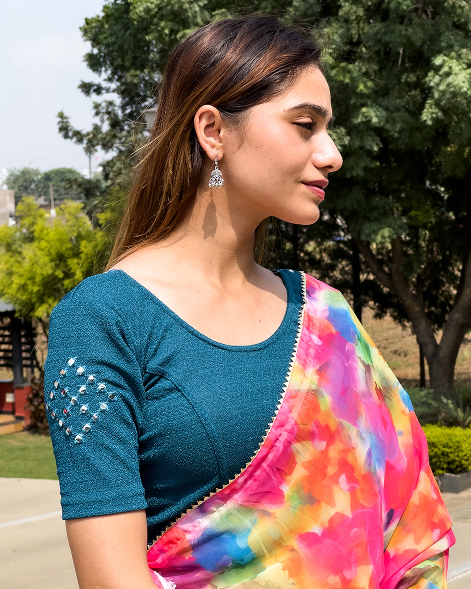 Side profile highlighting fit and sleeve structure.
