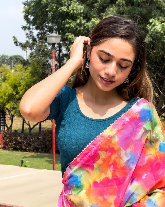 Model wearing the blouse with a saree for a festive ensemble ideal for Navratri.
