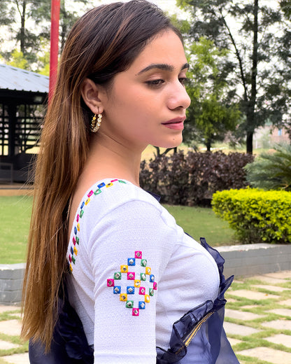 Side profile highlighting the sleeve shape and silhouette.