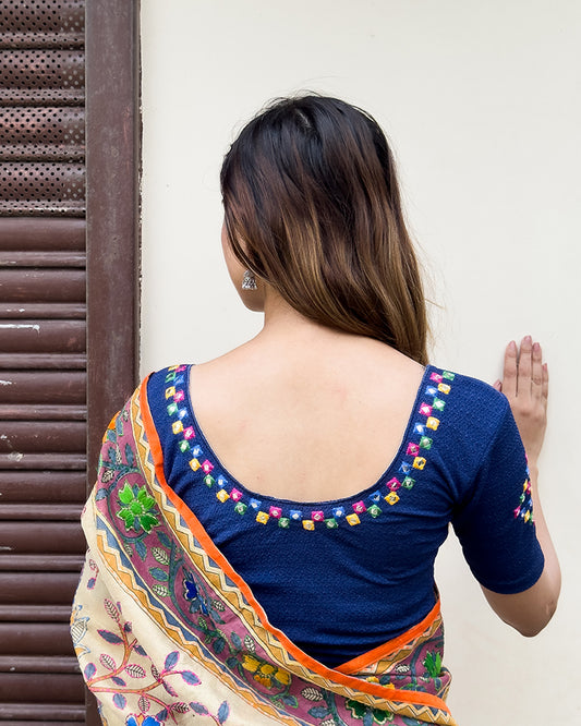 Rear view showcasing the embroidered details and back fit.