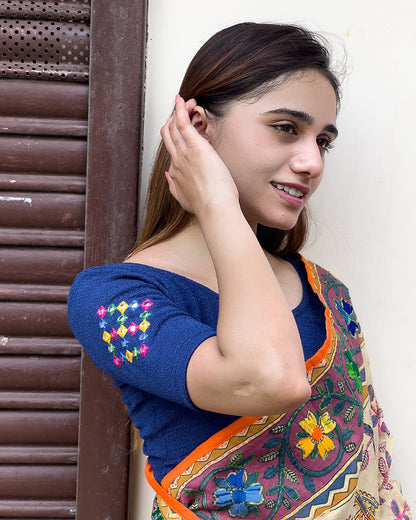 Model pairing the blouse with a saree, styled for festive occasions