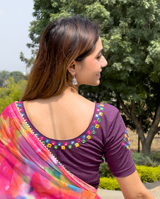 Rear view showcasing the embroidered details and back fit.