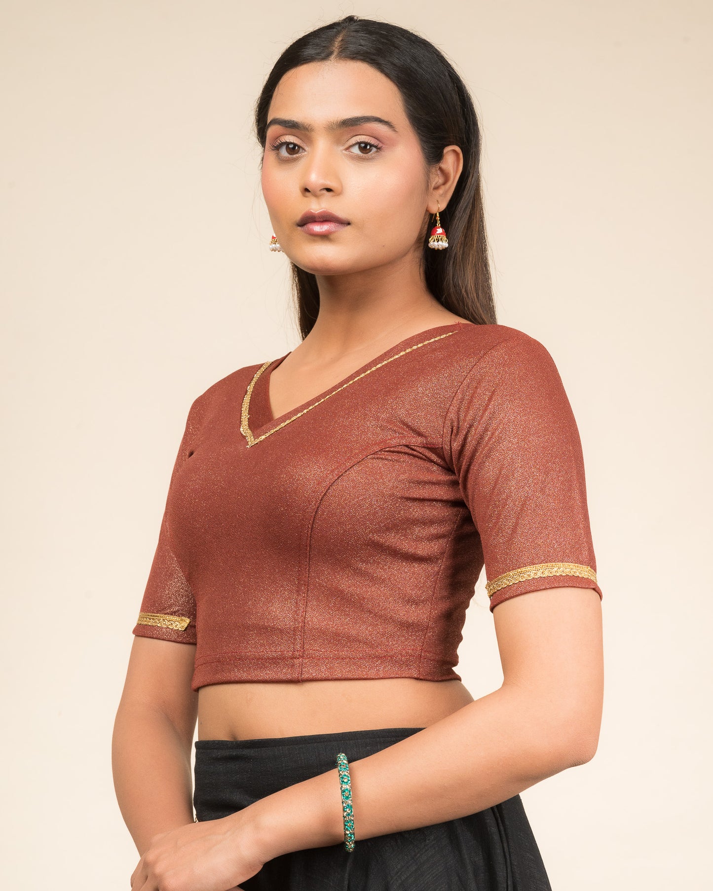 Side profile emphasizing sleeve structure and silhouette.