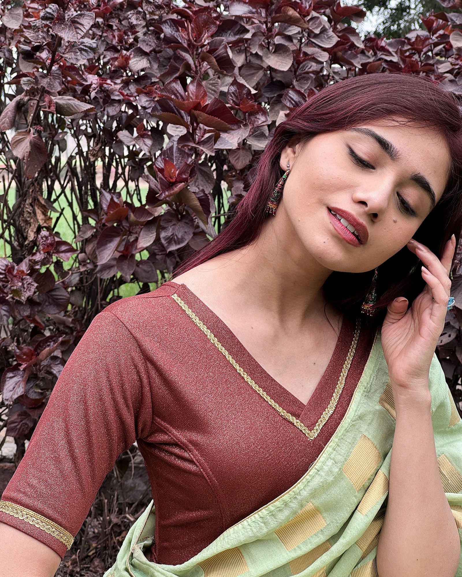 Model paired the blouse with a saree for a festive or evening occasion.