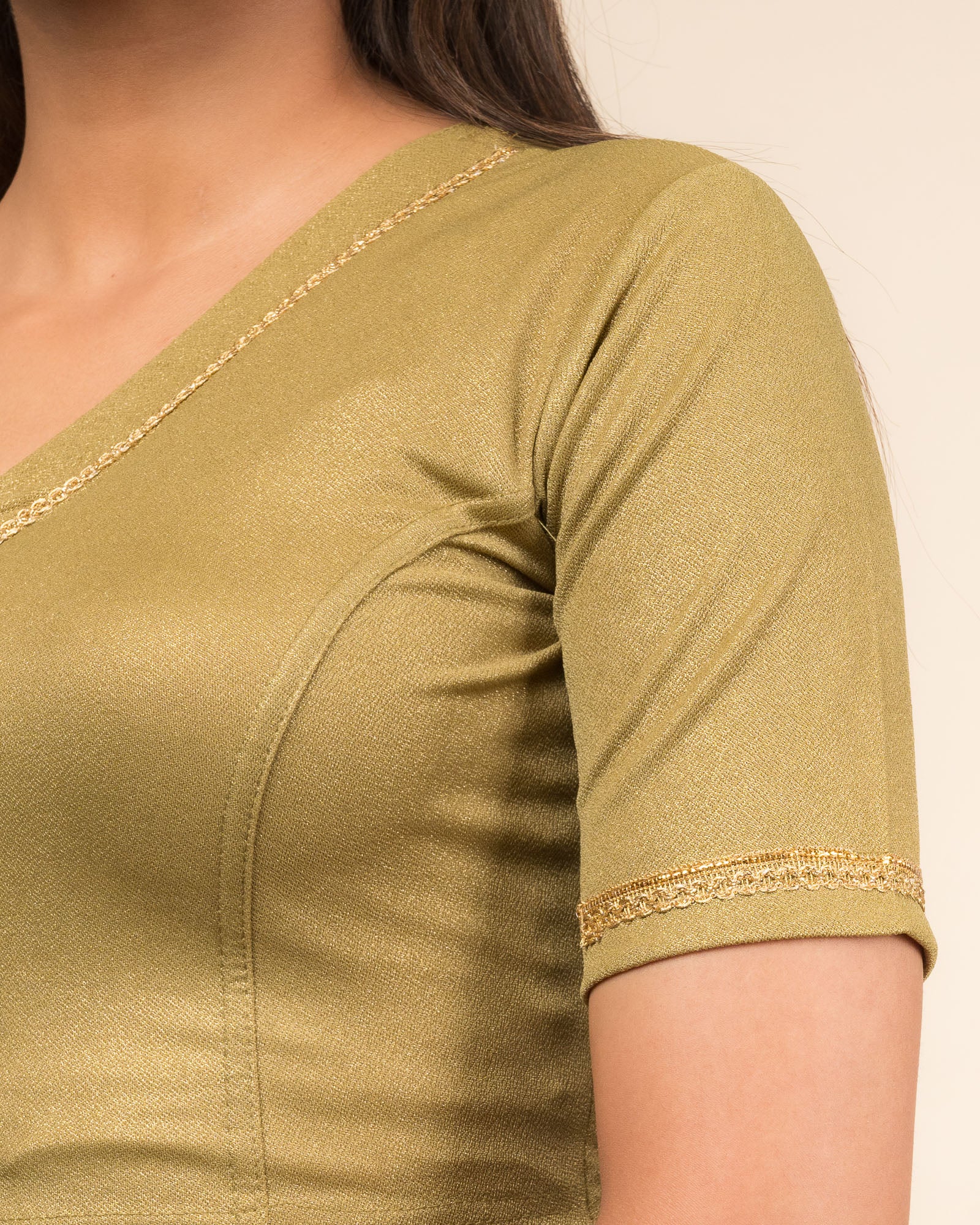 Close-up of the jacquard fabric with metallic finish.