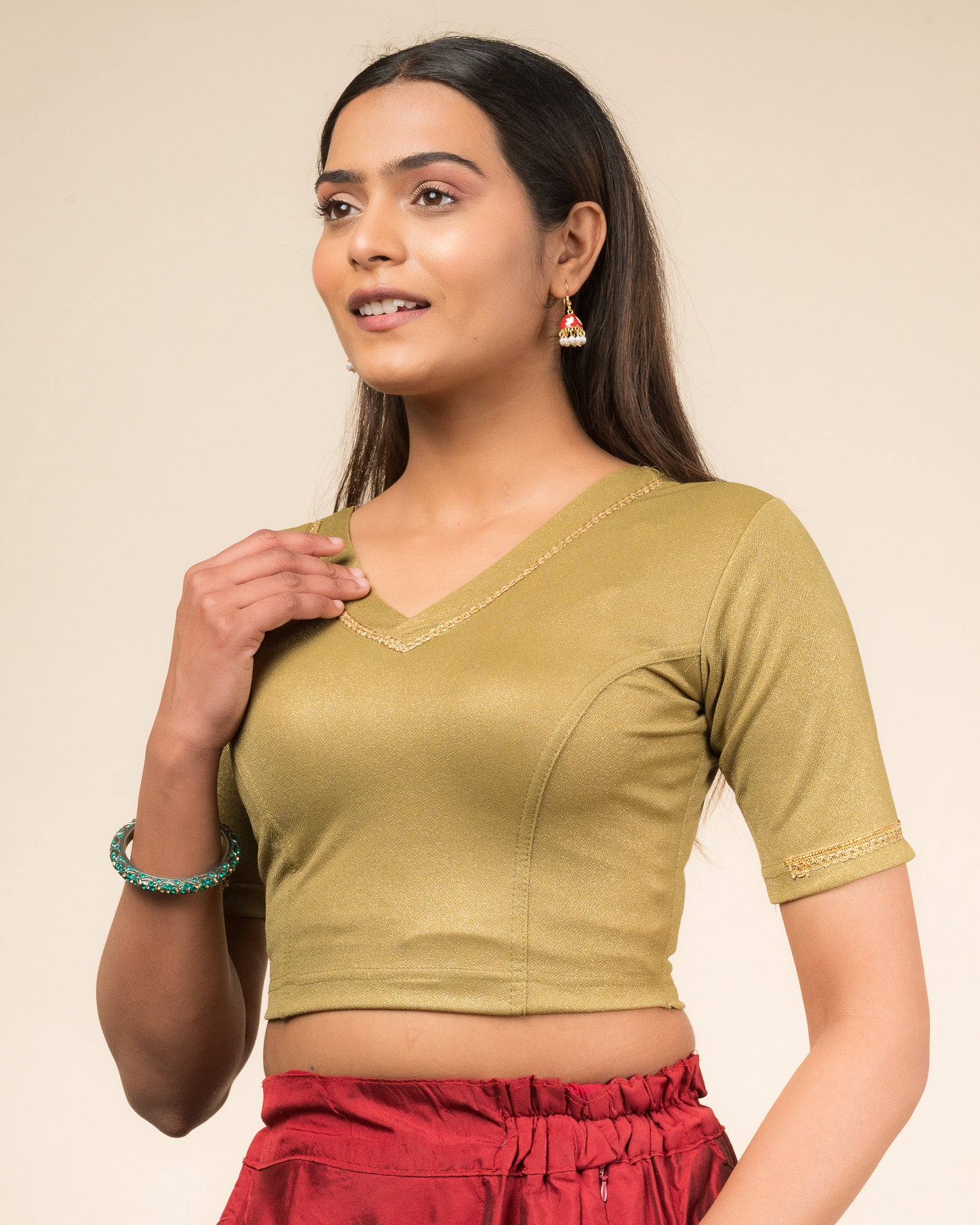 Side profile emphasizing sleeve structure and silhouette.