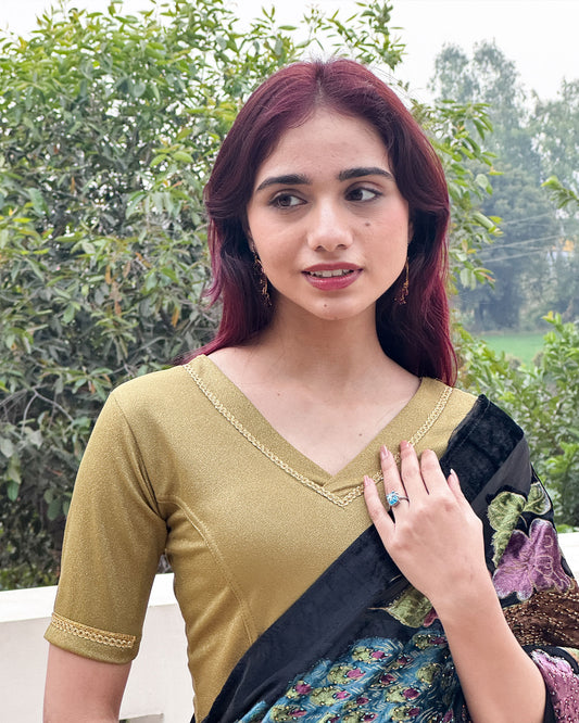 Model paired the blouse with a saree for a festive or evening occasion.