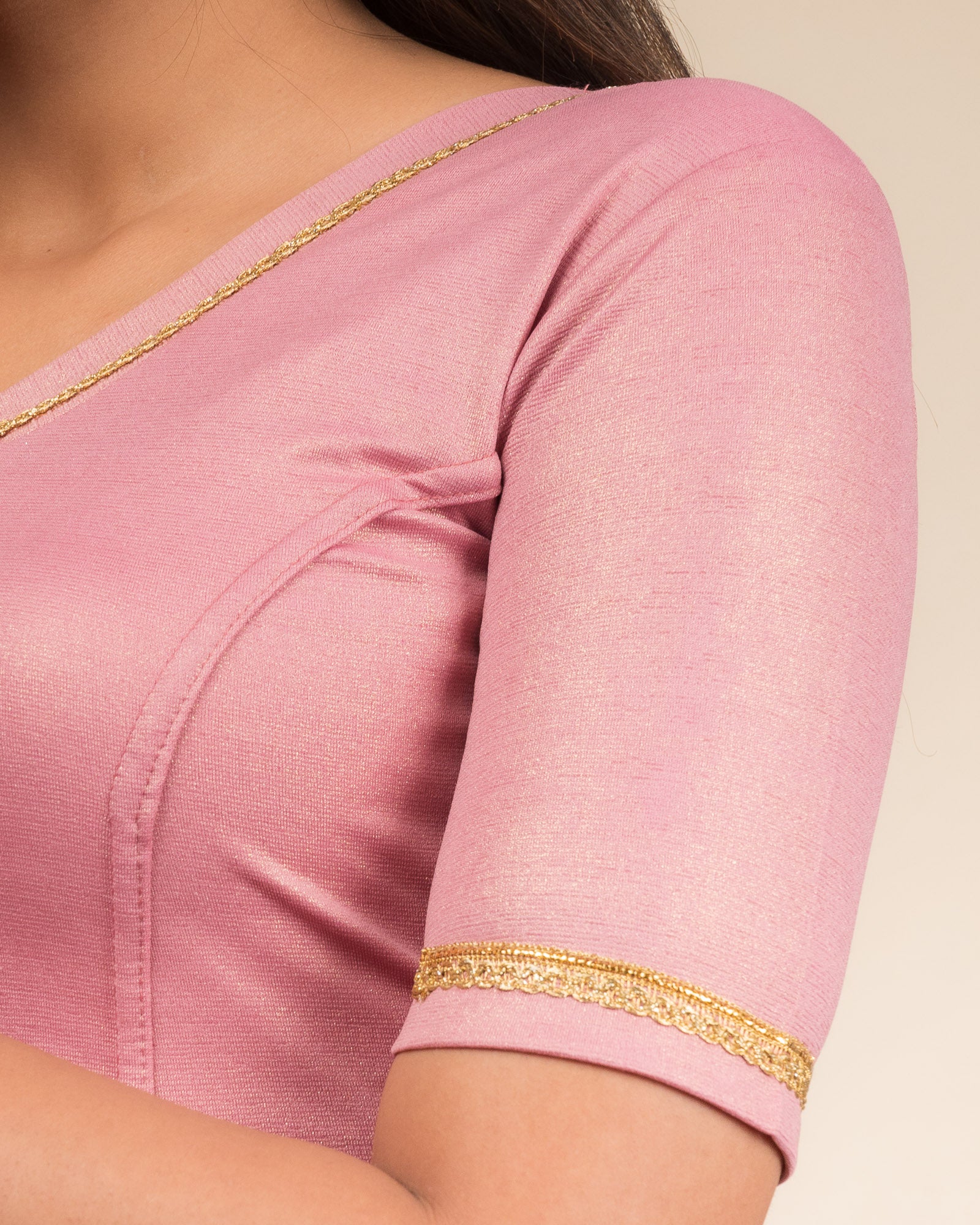 Close-up of the jacquard fabric with metallic finish.