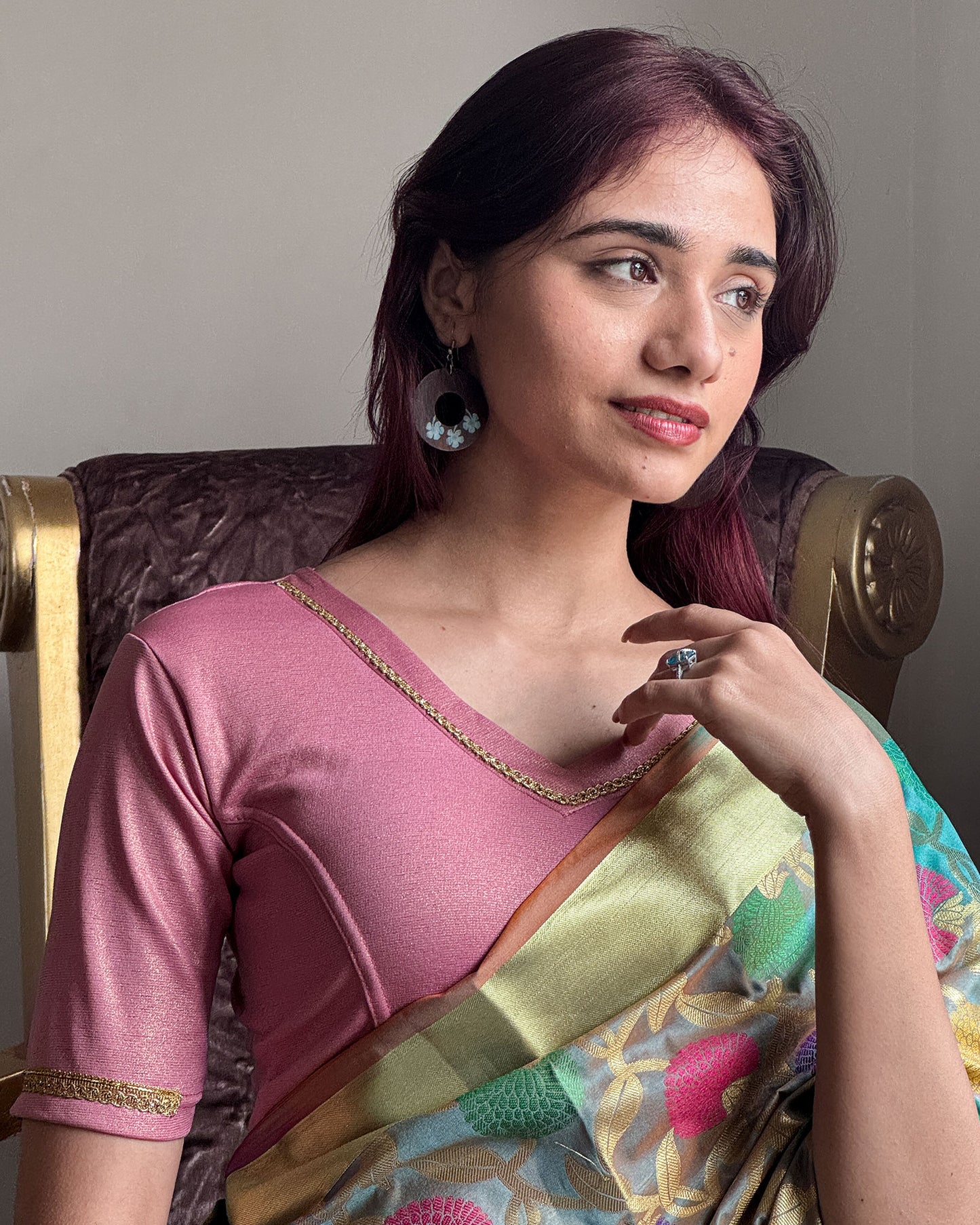 Model paired the blouse with a saree for a festive or evening occasion.