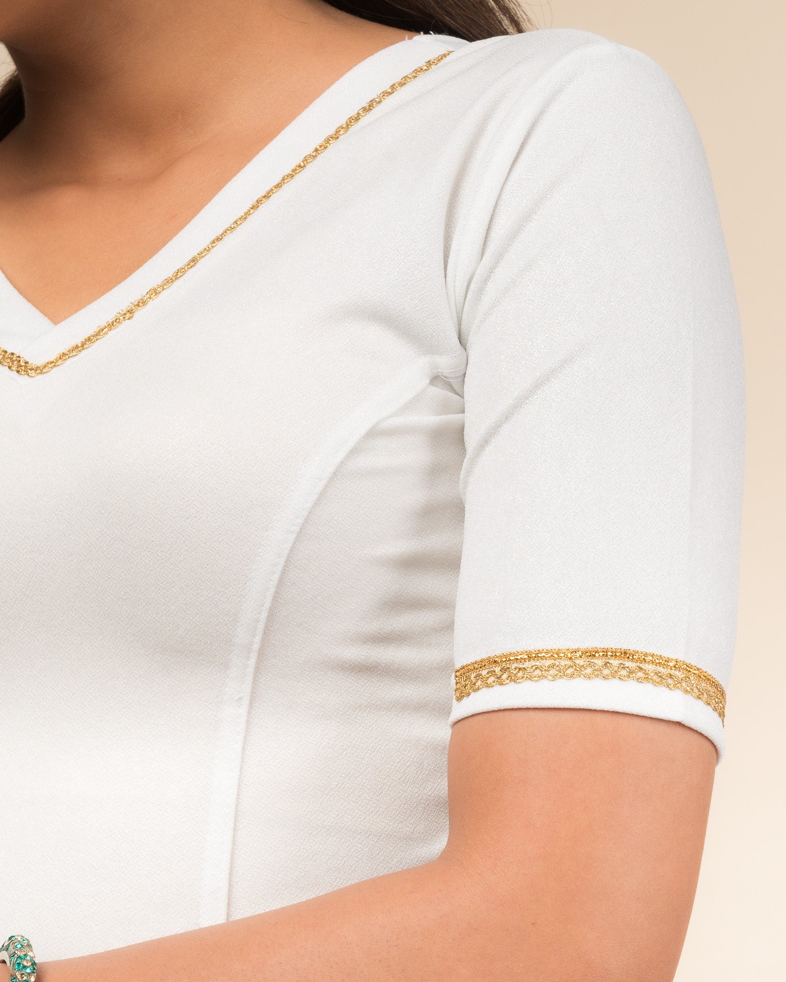Close-up of the jacquard fabric with metallic finish.