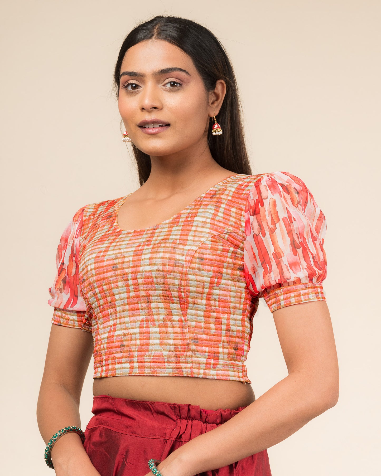 Side profile highlighting the puff sleeve volume and side fit.