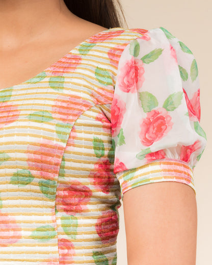 Close-up showing printed texture and sheer organza detail.