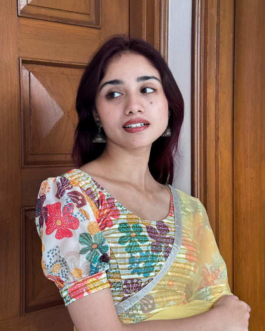 Model styled the blouse with a saree for a bold, festive look.