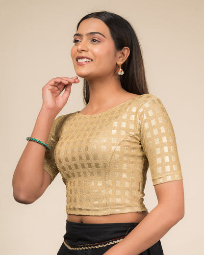 Side profile highlighting the silhouette and sleeve structure.