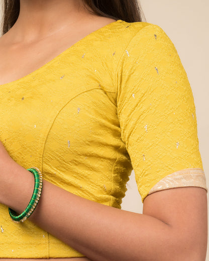 Close-up showing jacquard fabric with metallic drop accents.