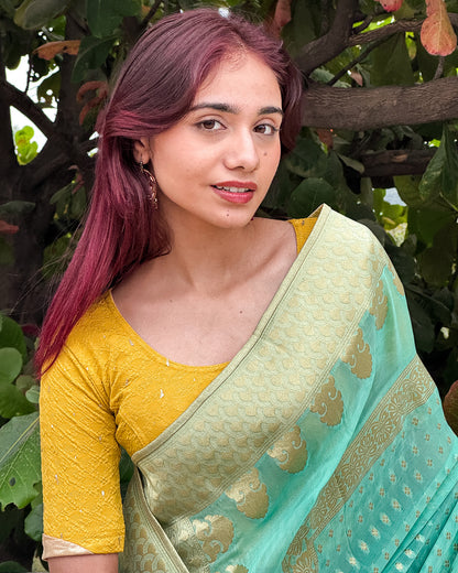 Model styled the blouse with a saree for an elevated festive look.