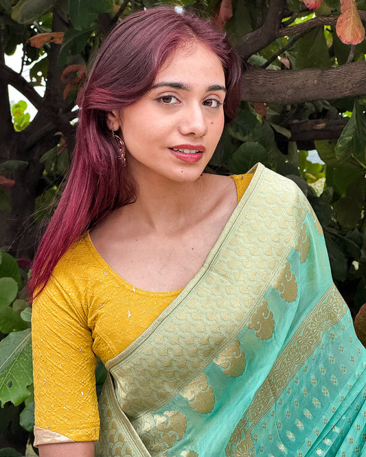Model styled the blouse with a saree for an elevated festive look.