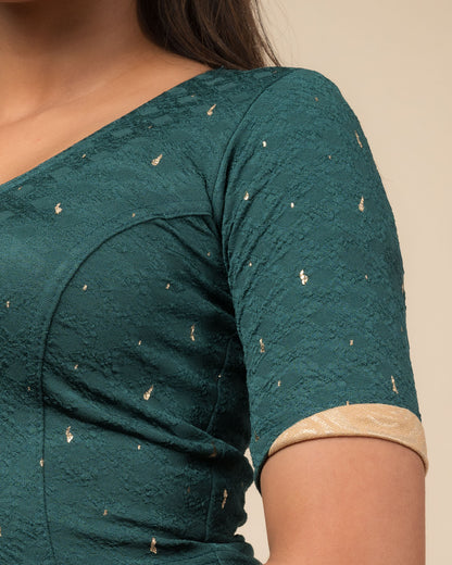 Close-up showing jacquard fabric with metallic drop accents.