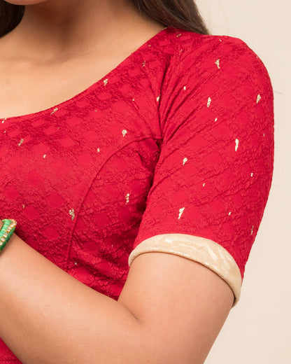 Close-up showing jacquard fabric with metallic drop accents.