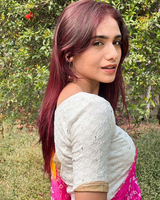 Model styled the blouse with a saree for an elevated festive look.