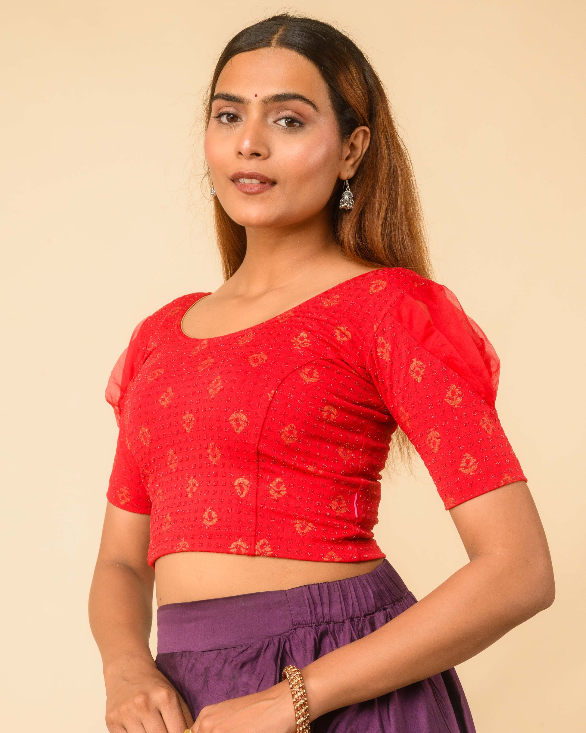 Paavna Gold–silver metallic buti Dobby Zari Jacquard stretchable saree blouse with organza puff elbow sleeves and round neck, by Advi, Red side