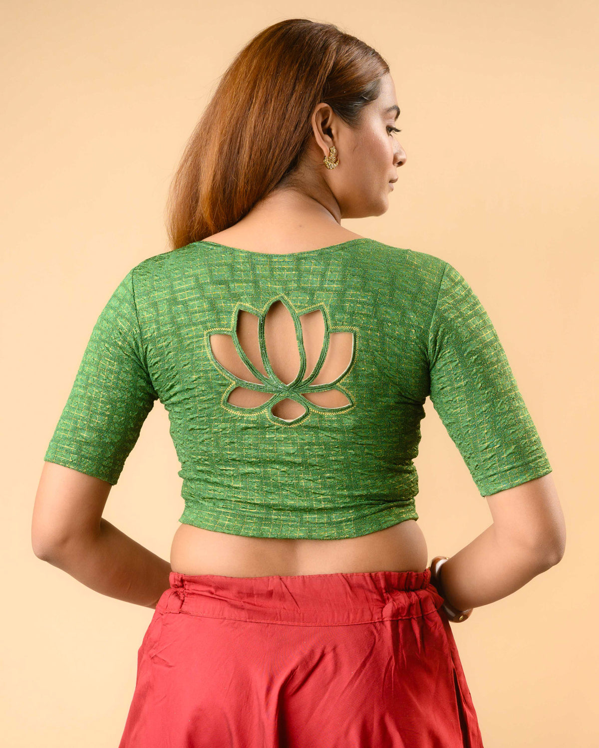 Padmaja Bottle Green stretchable blouse showing the lotus cutout back by Advi - back