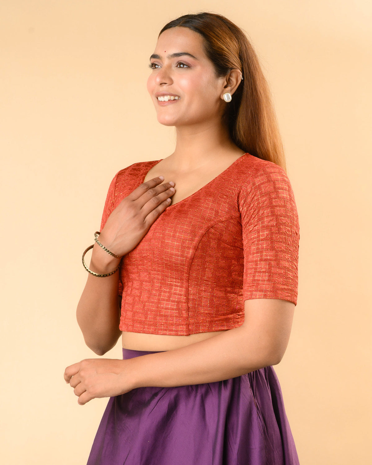 Padmaja Rust stretchable blouse showing the lotus cutout Side by Advi - Side