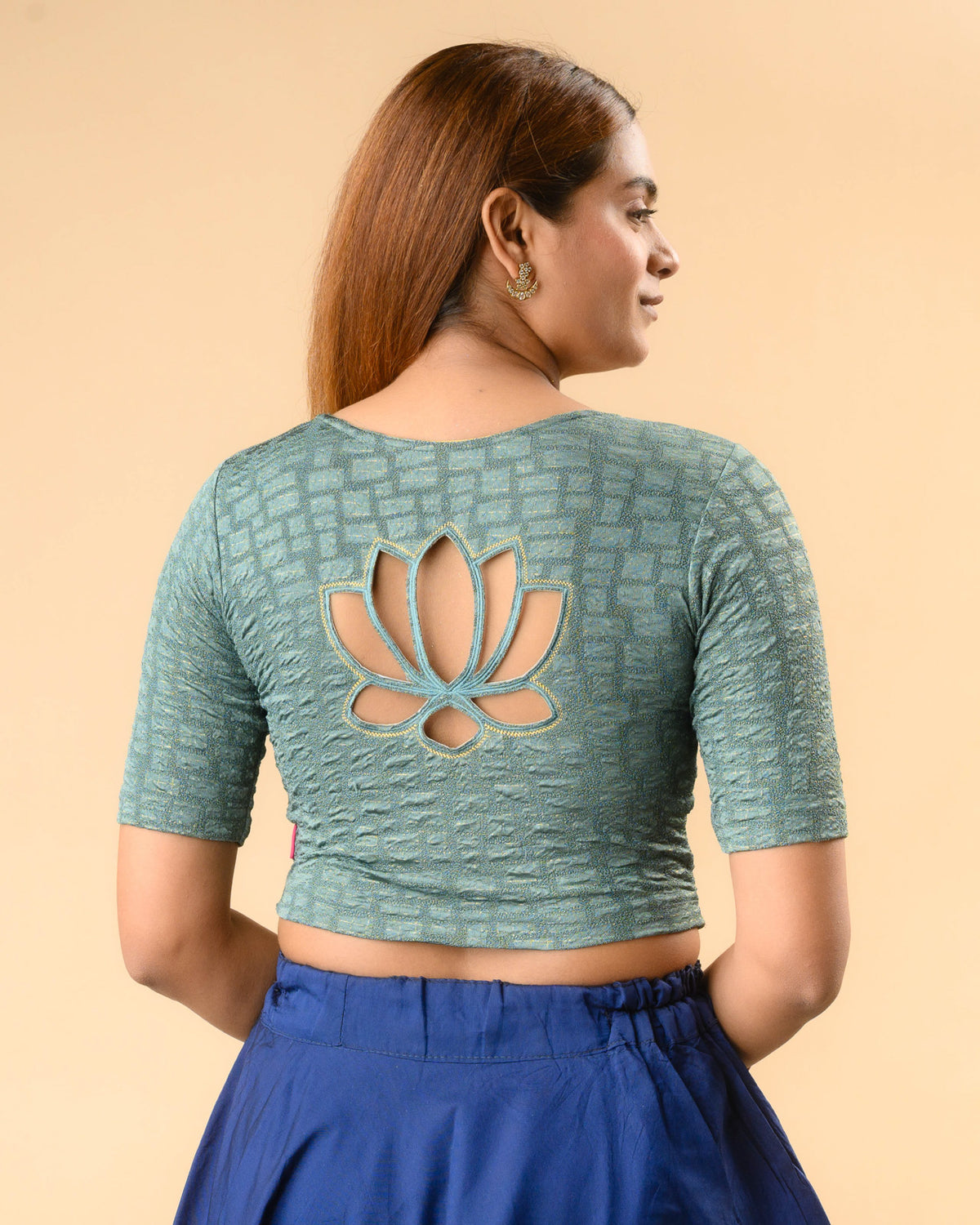 Padmaja Sea Green stretchable blouse showing the lotus cutout back by Advi - back