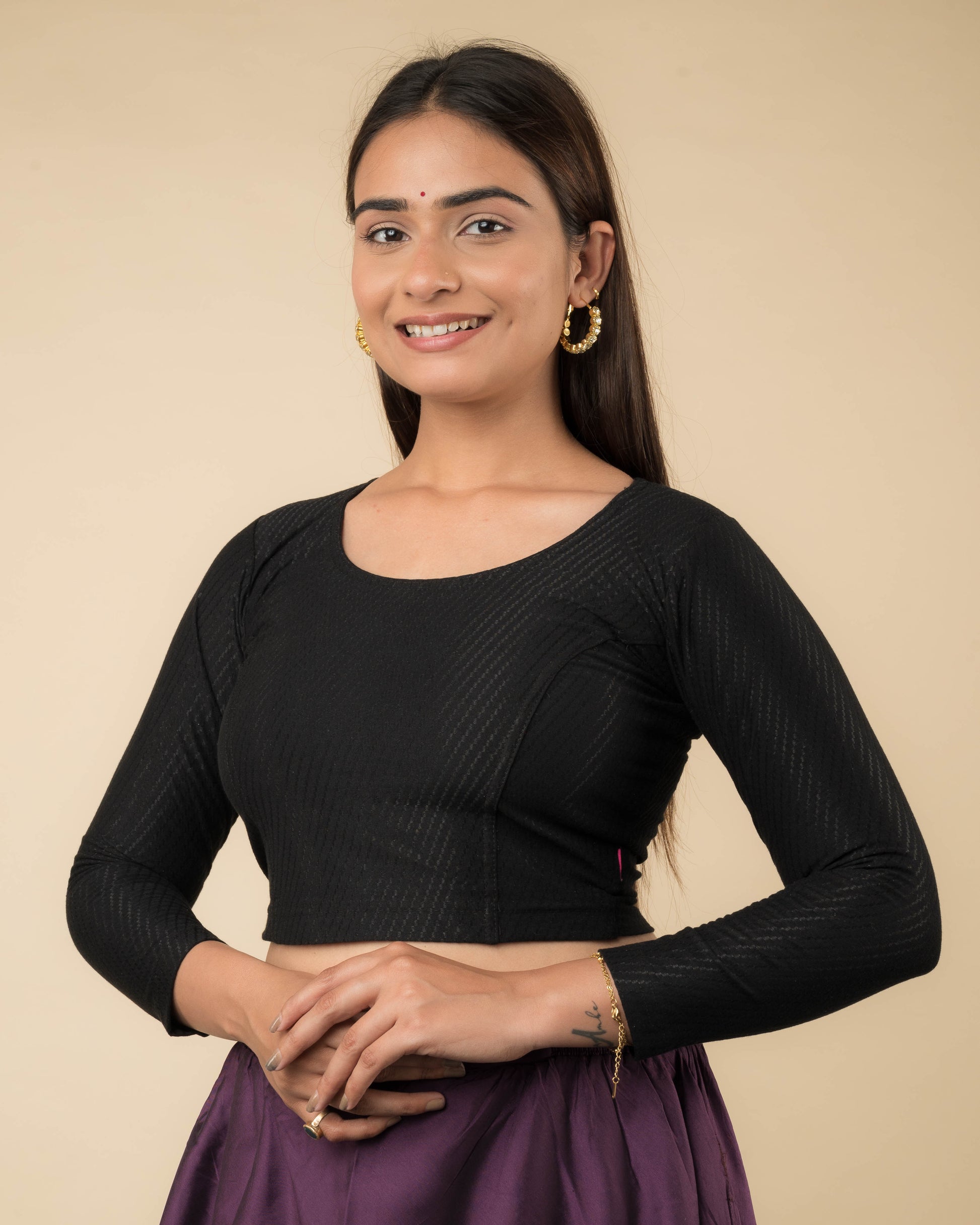 Side profile highlighting the sleeve length and silhouette