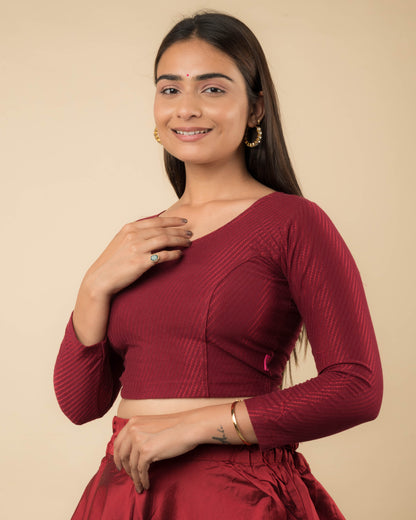 Side profile highlighting the sleeve length and silhouette