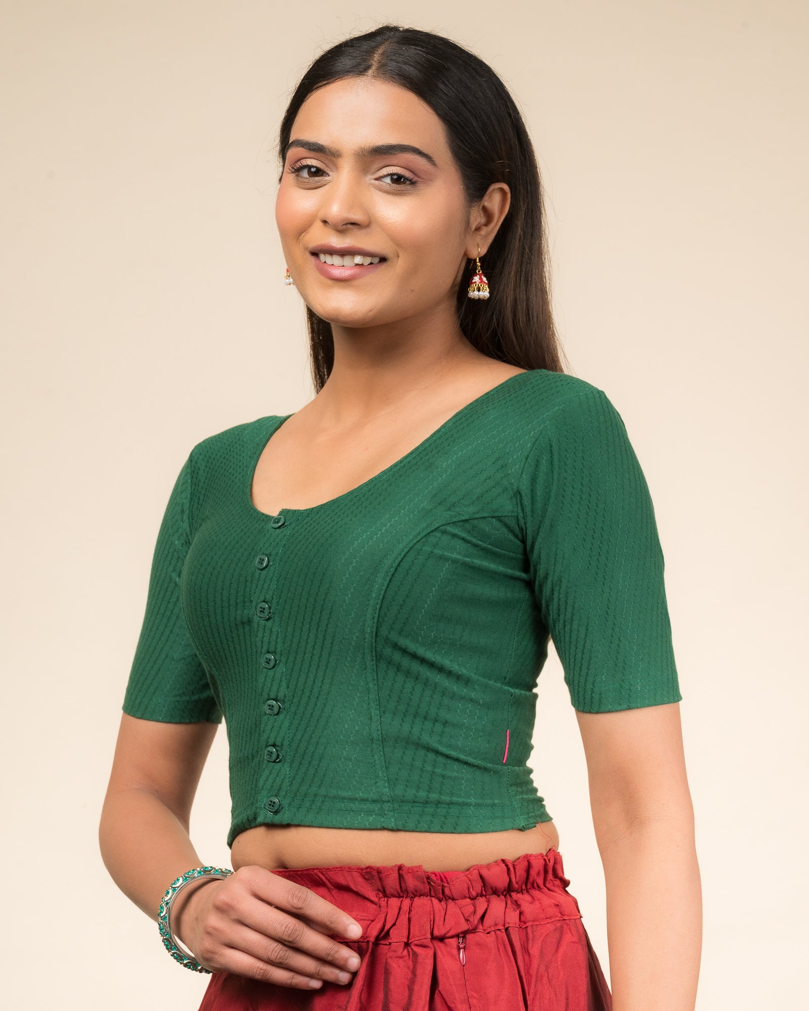  Side profile highlighting the sleeve length and silhouette.