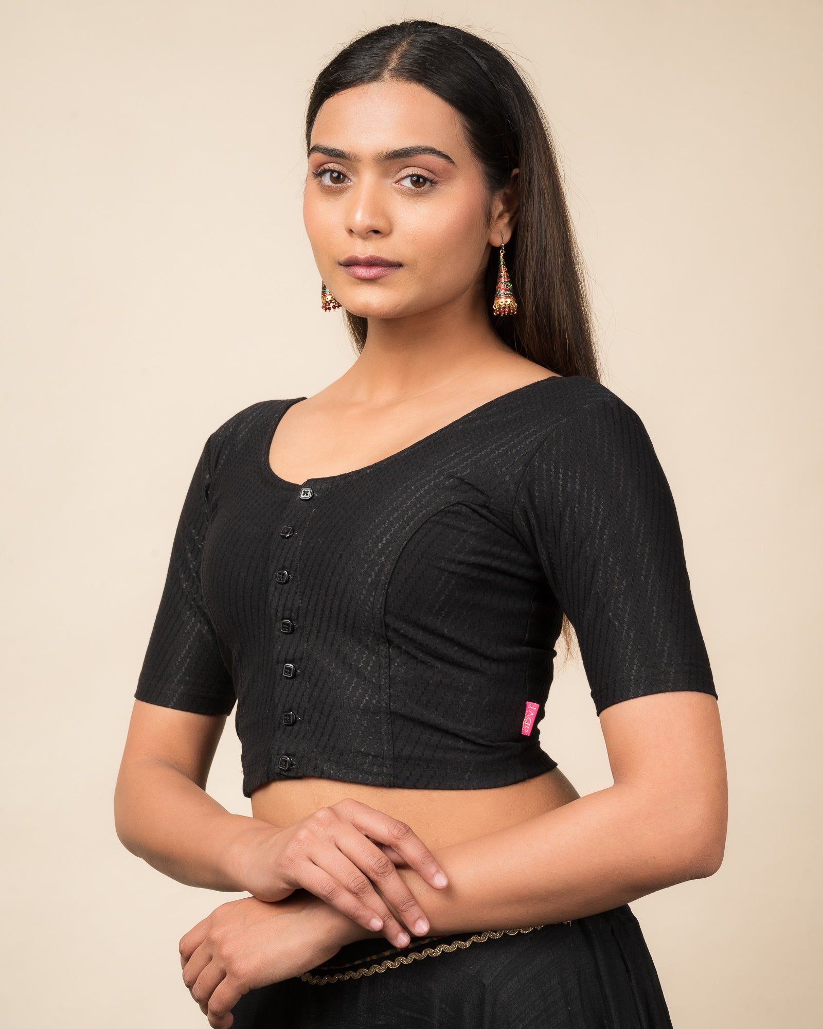 Side profile highlighting the sleeve length and silhouette.