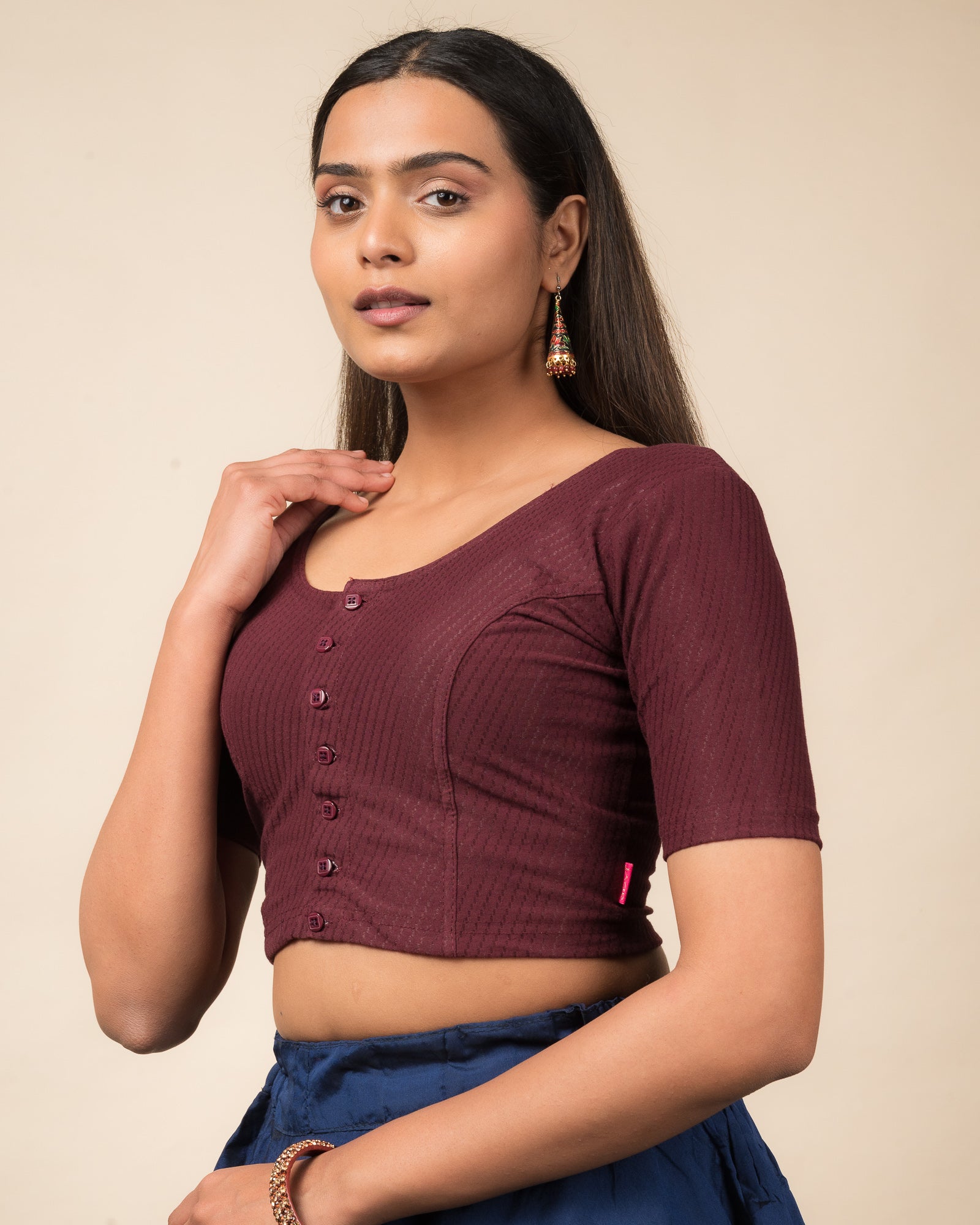  Side profile highlighting the sleeve length and silhouette.