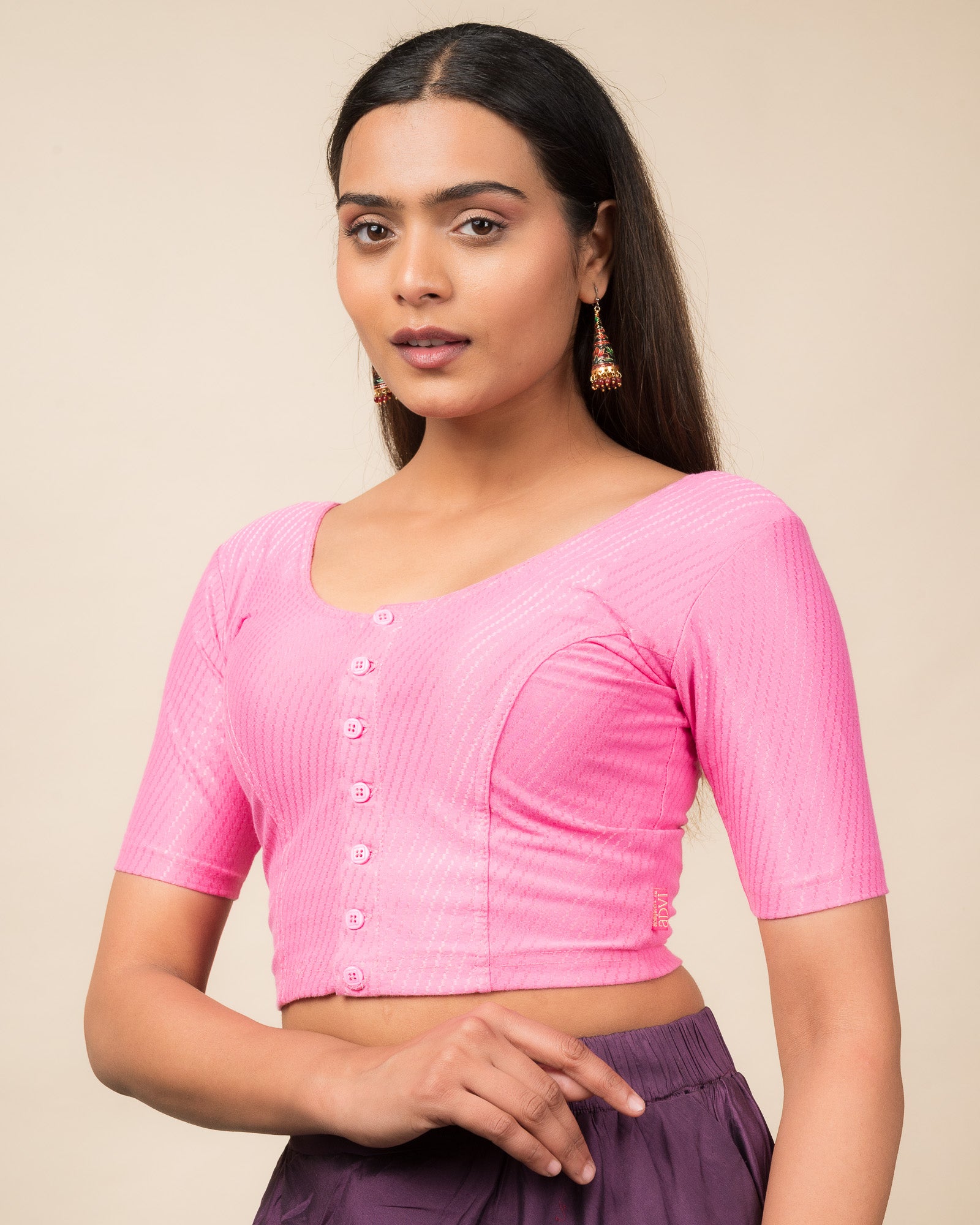  Side profile highlighting the sleeve length and silhouette.