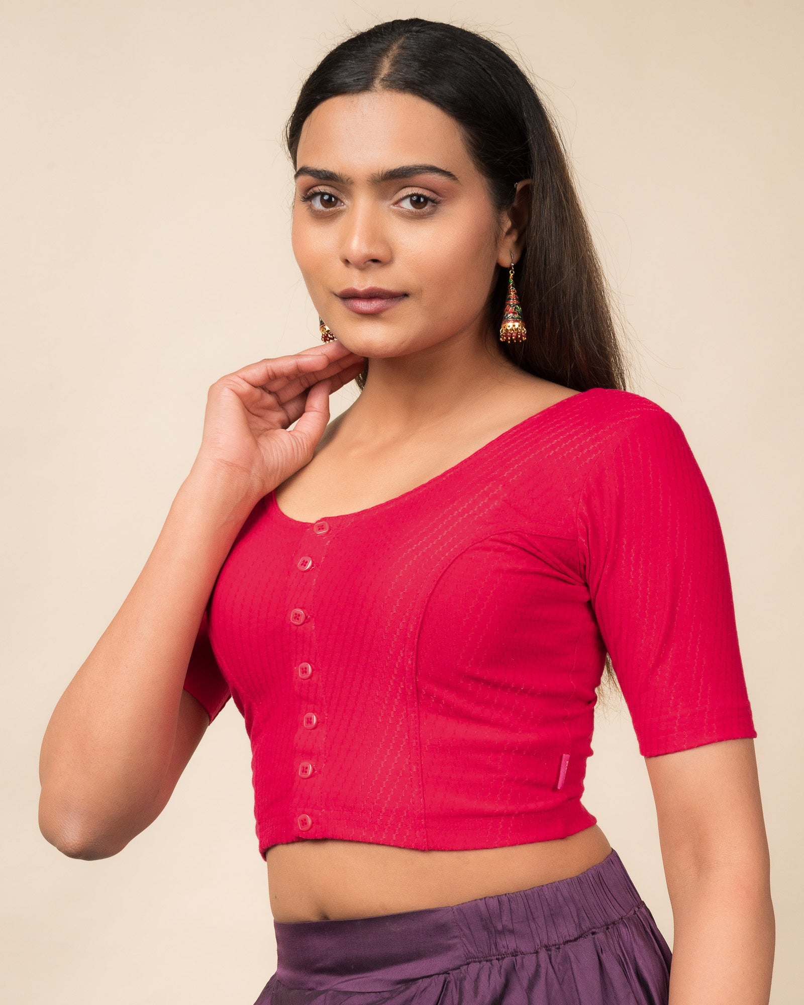  Side profile highlighting the sleeve length and silhouette.