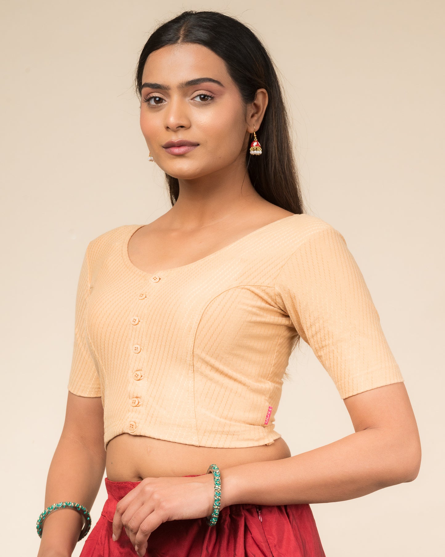  Side profile highlighting the sleeve length and silhouette.