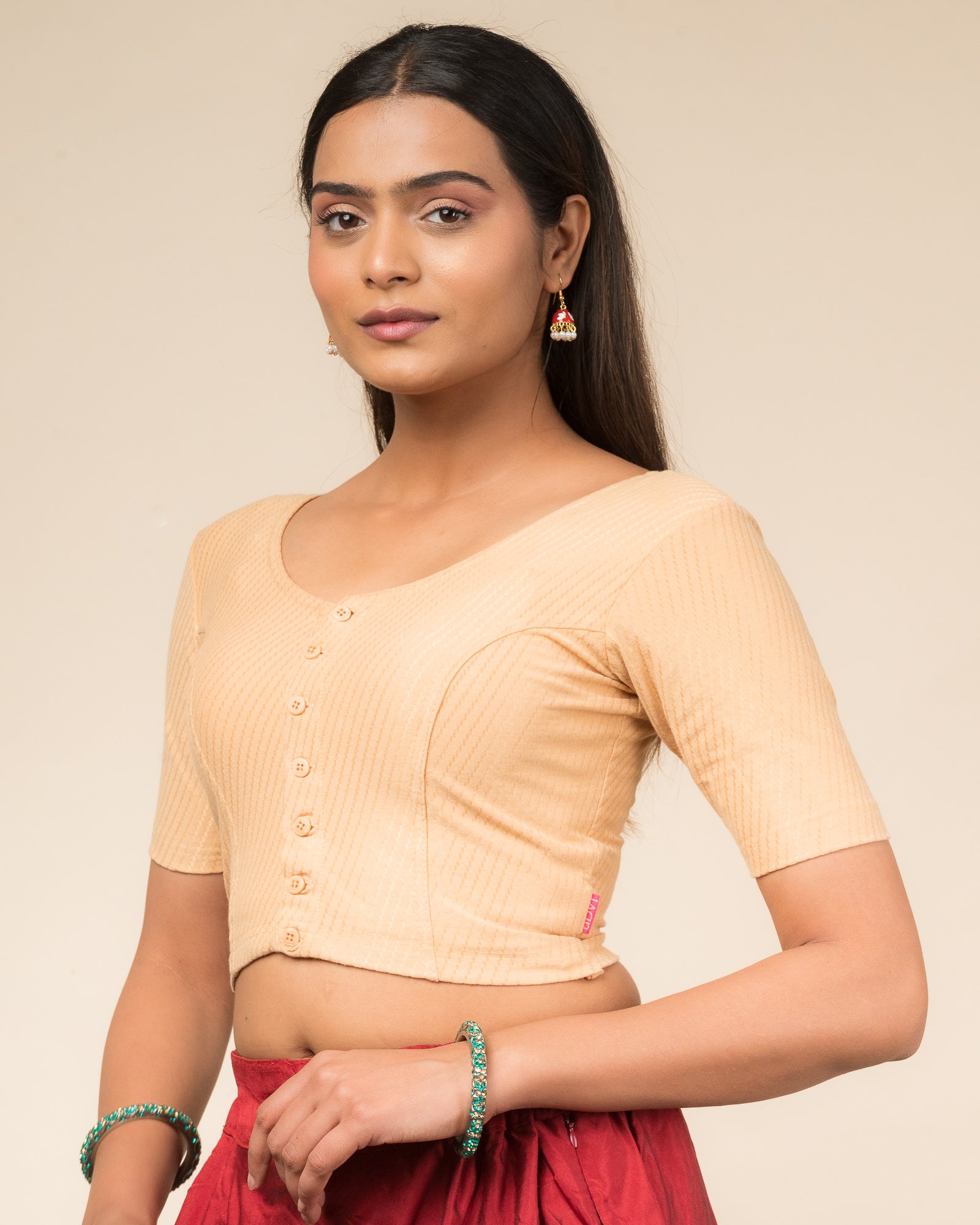  Side profile highlighting the sleeve length and silhouette.