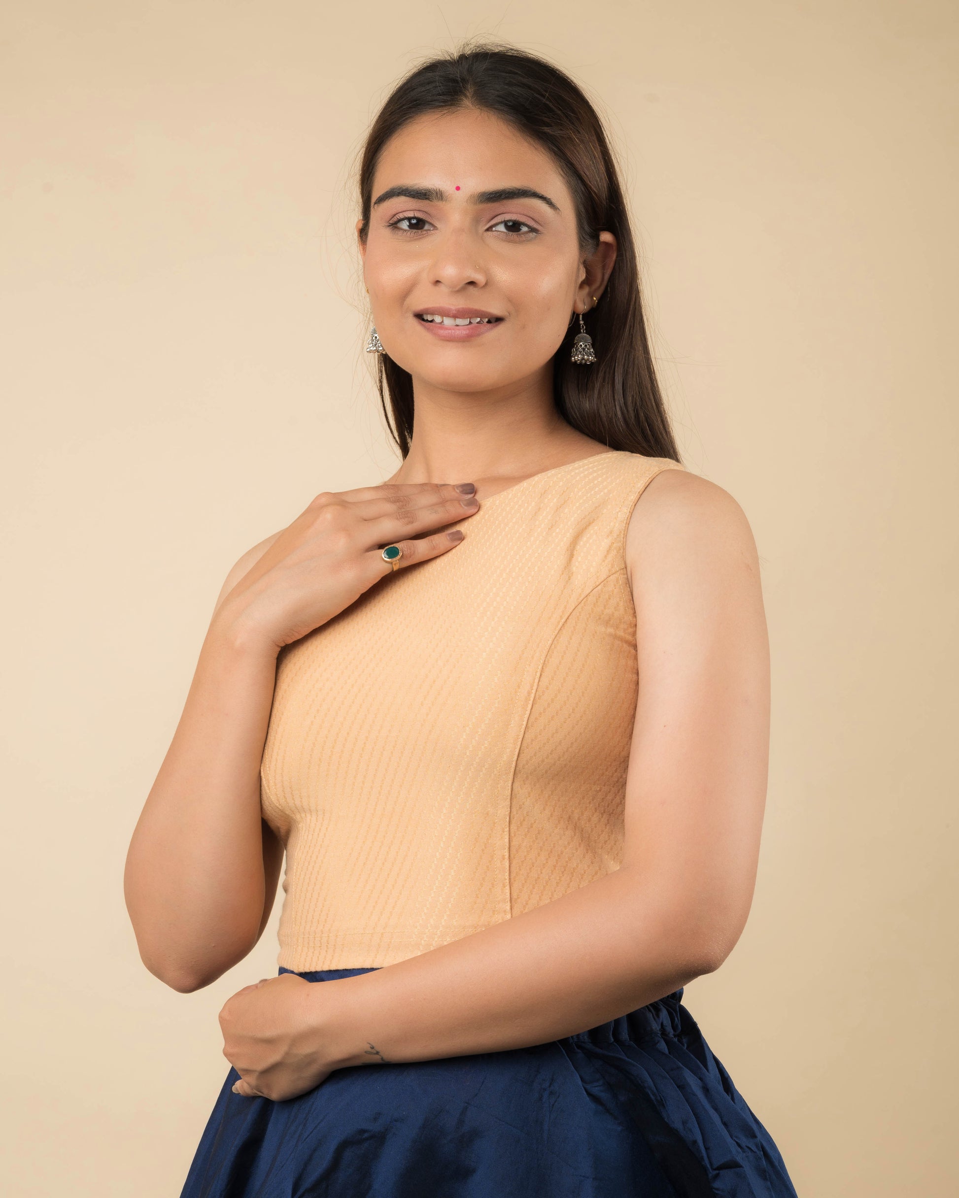 Side profile highlighting the fit and high neckline