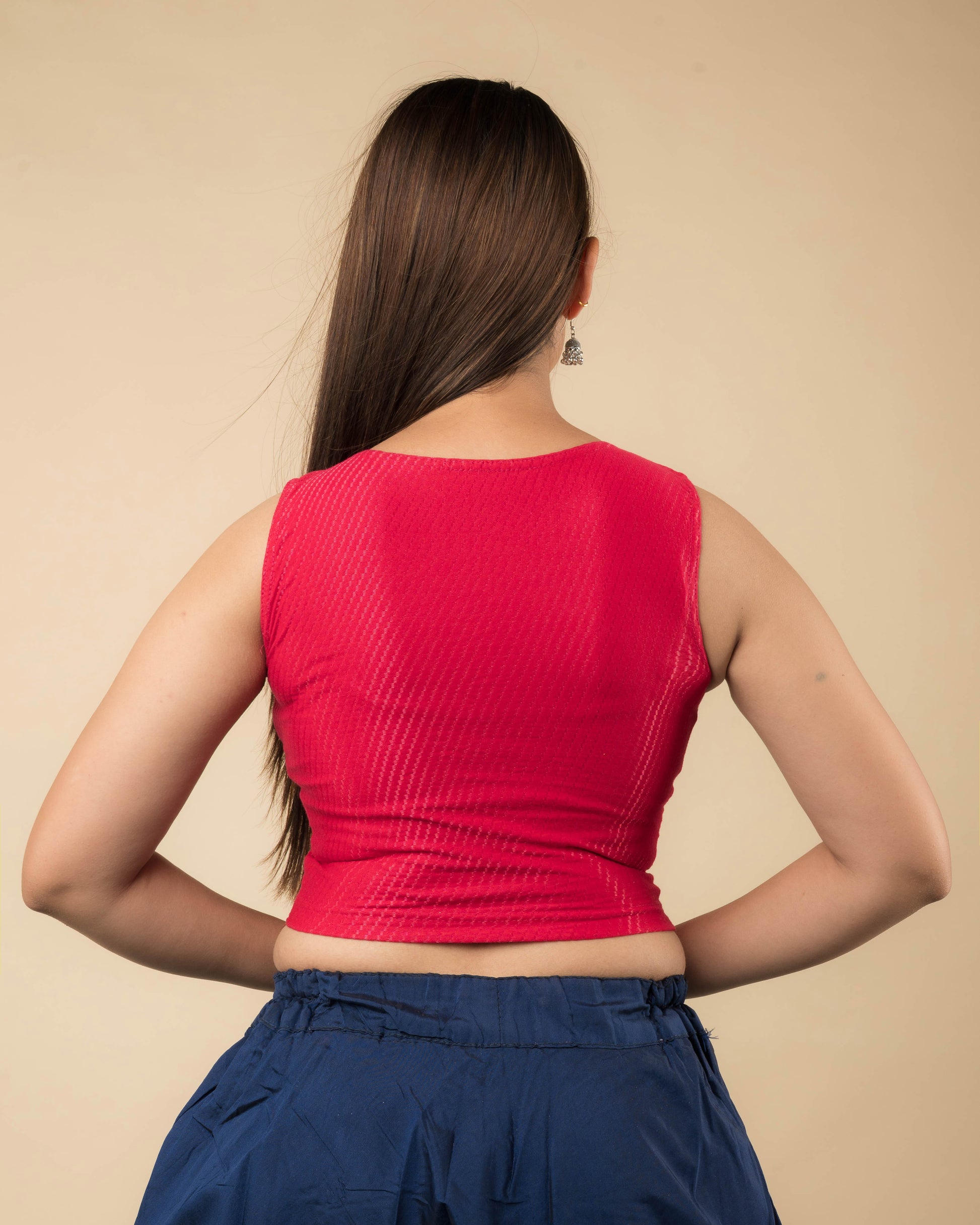 Rear view showcasing the back design of the slip-on blouse