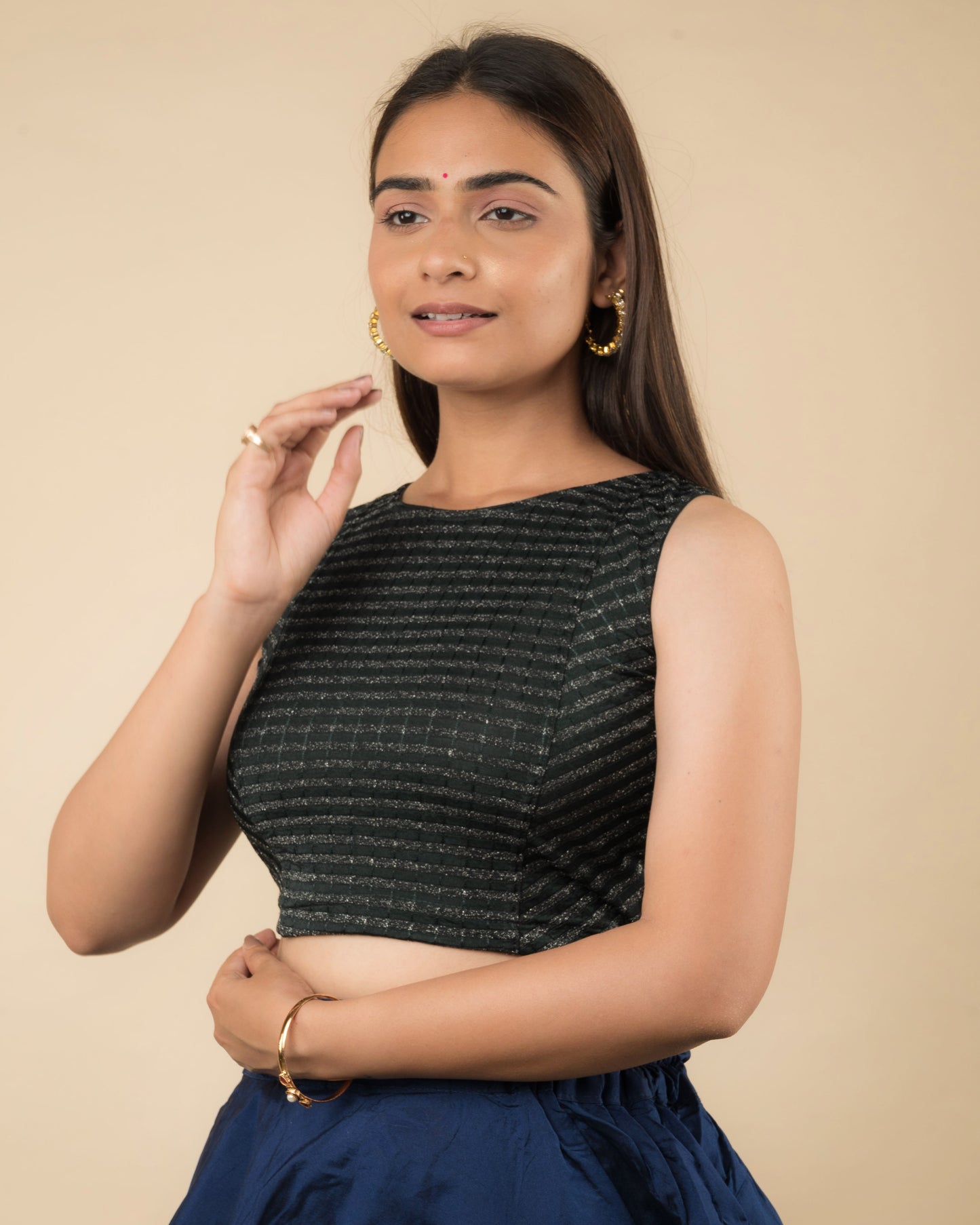 Dhara Bottle Green Striped Stretchable Sleeveless Blouse by Advi