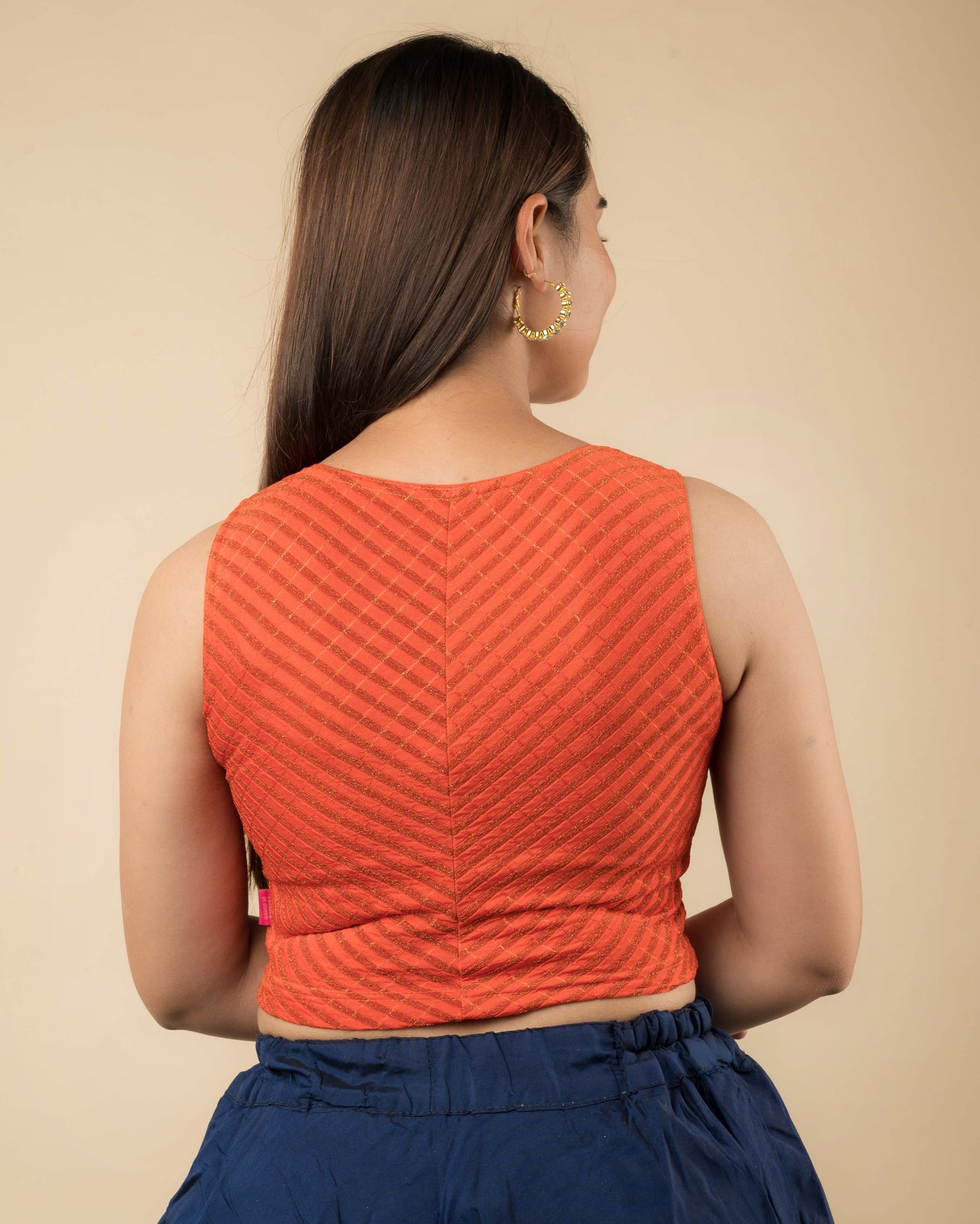 Dhara Orange Sleeveless Blouse with Metallic Stripes by Advi
