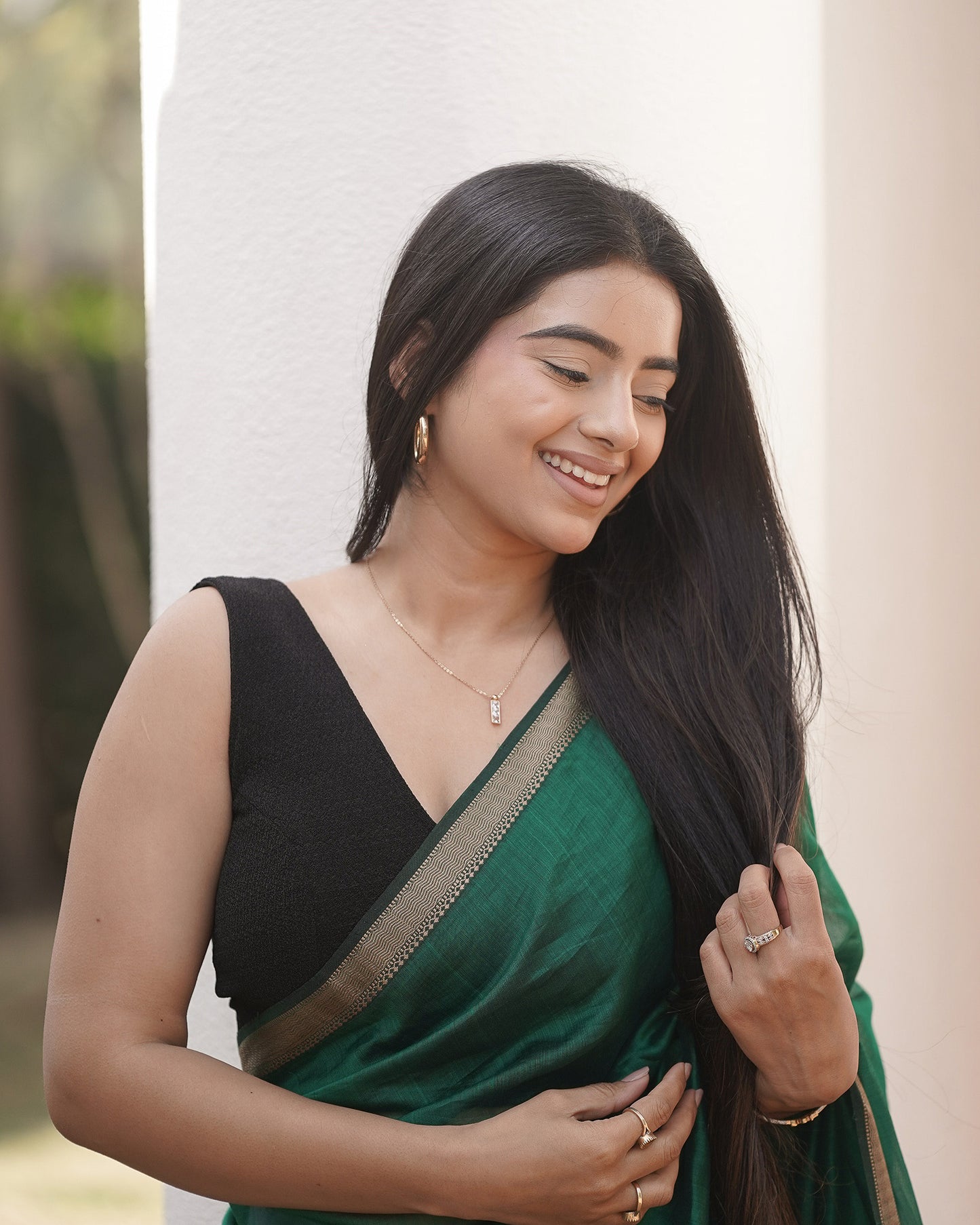 Sumti Black V-Neck Sleeveless Blouse with Removable Pads