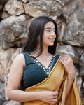 Sameera Bottle Green V-Neck Embroidered Sleeveless Blouse with Pads