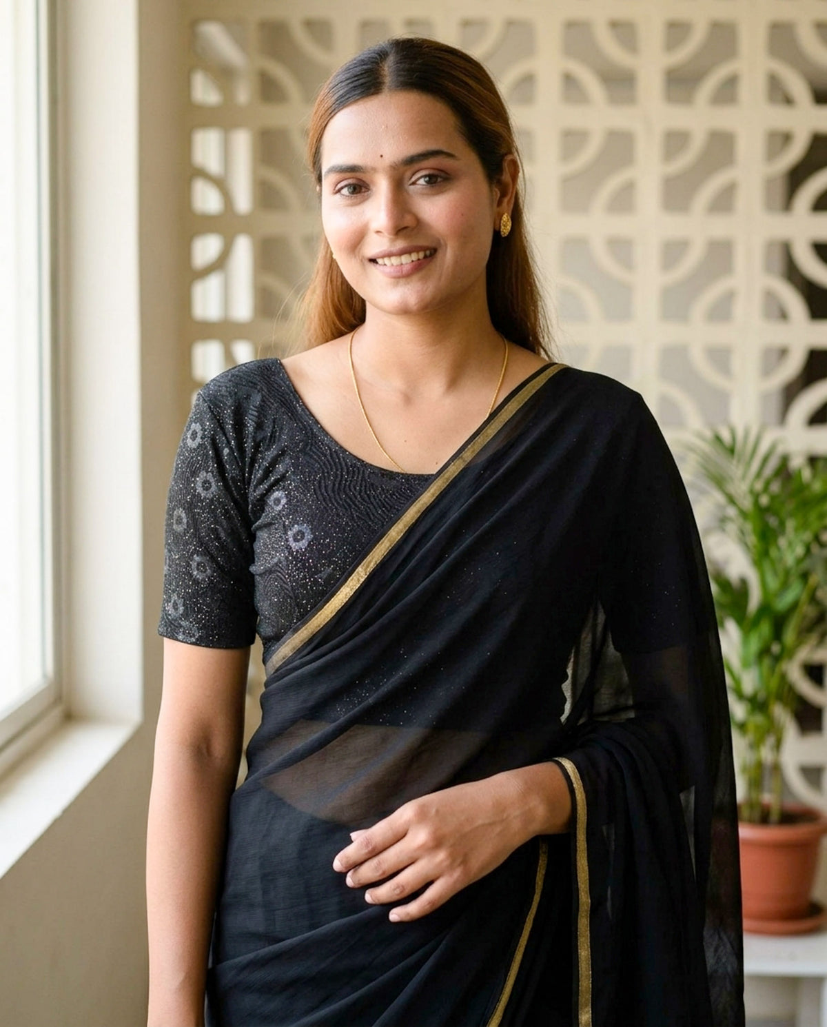 Daisy black embossed floral glitter blouse styled with a saree by Advi - lookbook