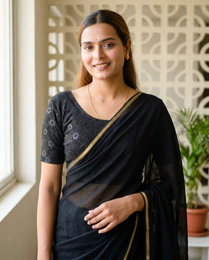 Daisy black embossed floral glitter blouse styled with a saree by Advi - lookbook