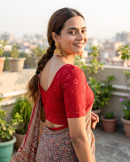 Daisy maroon embossed floral glitter blouse styled with a saree by Advi - lookbook