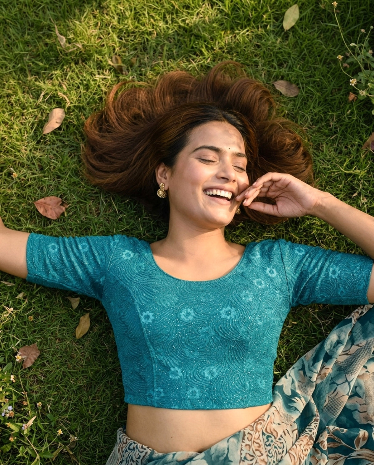 Daisy rama green embossed floral glitter blouse styled with a saree by Advi - lookbook