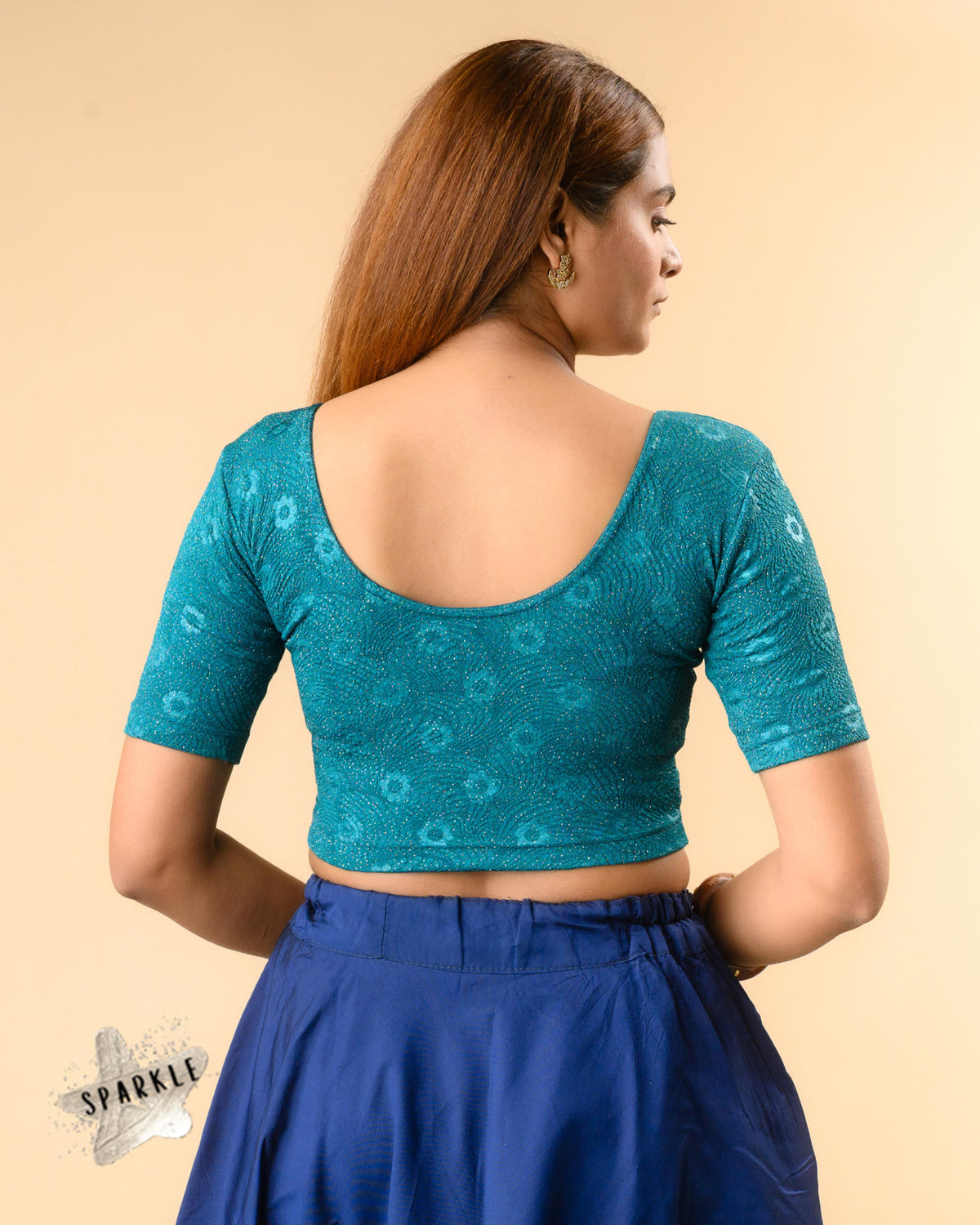 Daisy rama green stretch blouse showing the deep round back by Advi - back