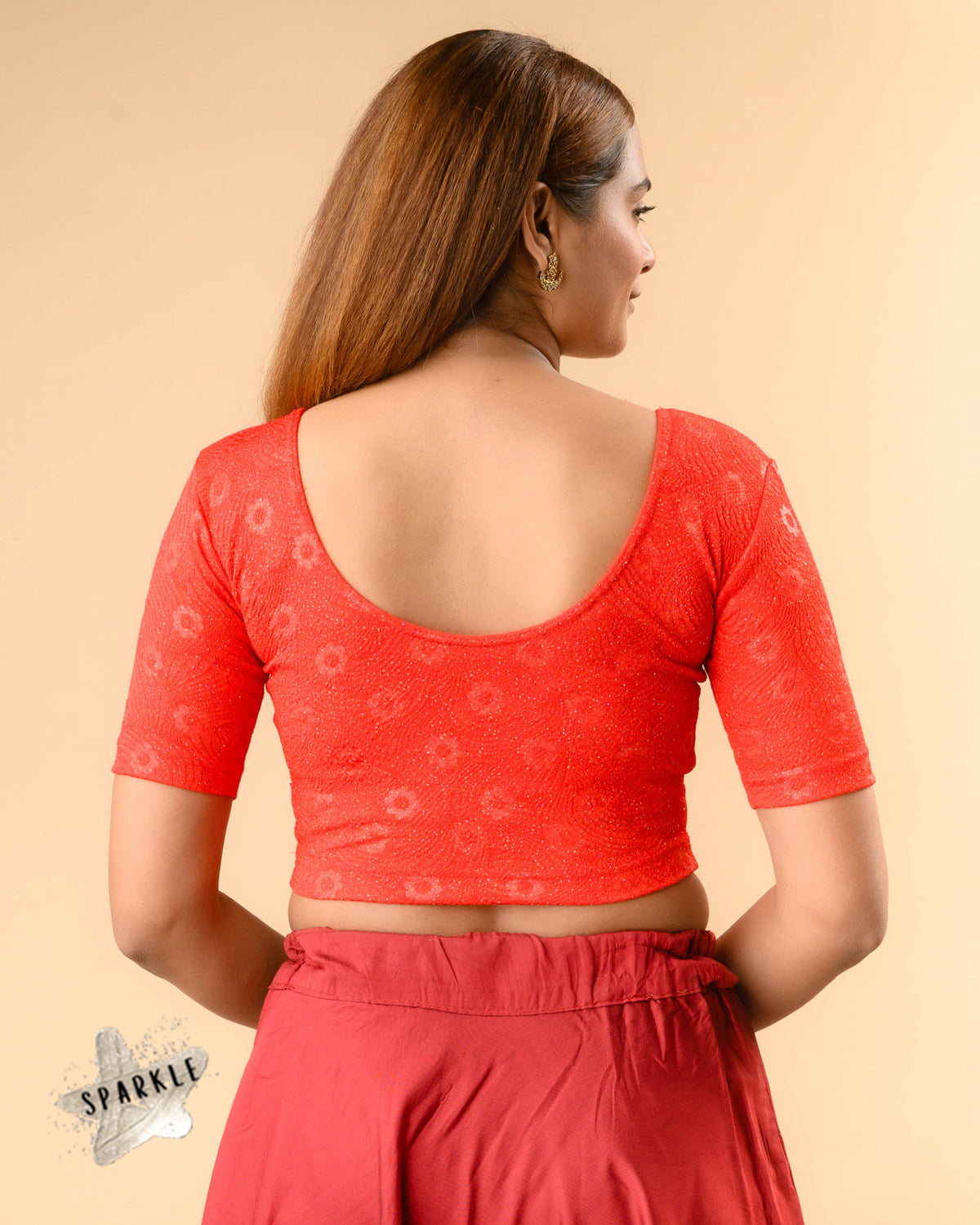 Daisy red stretch blouse showing the deep round back by Advi - back